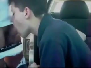 Sucking a cock seated in his car