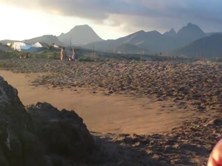 masturbation beach in front two girls with cum