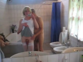 crosdresser having a blowjob by an old guy